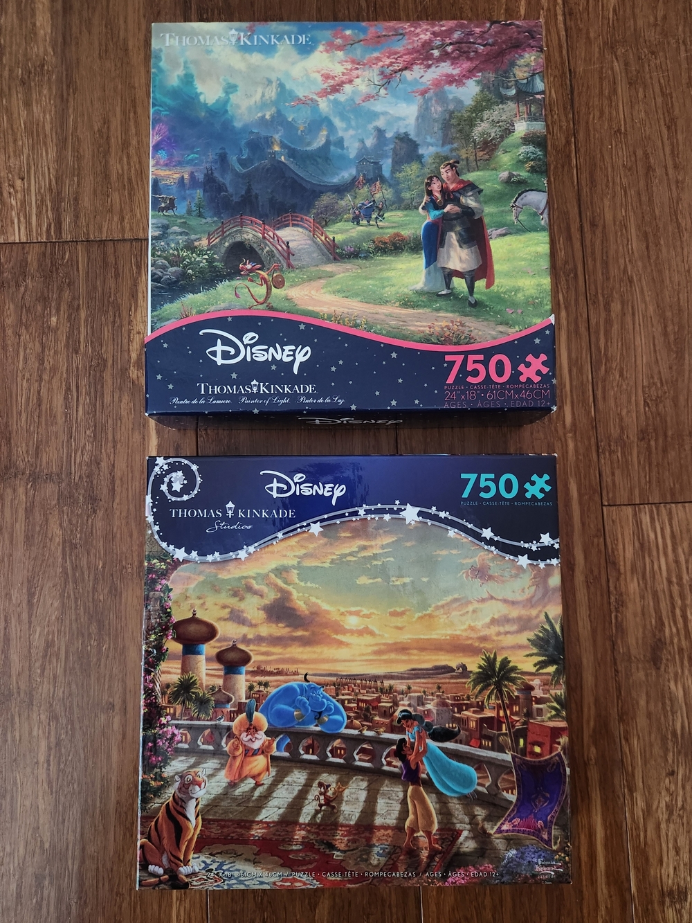 Set Of 2 Disney Thomas Kinkade 750 Piece Collectible Puzzles - Mulan And Aladdin